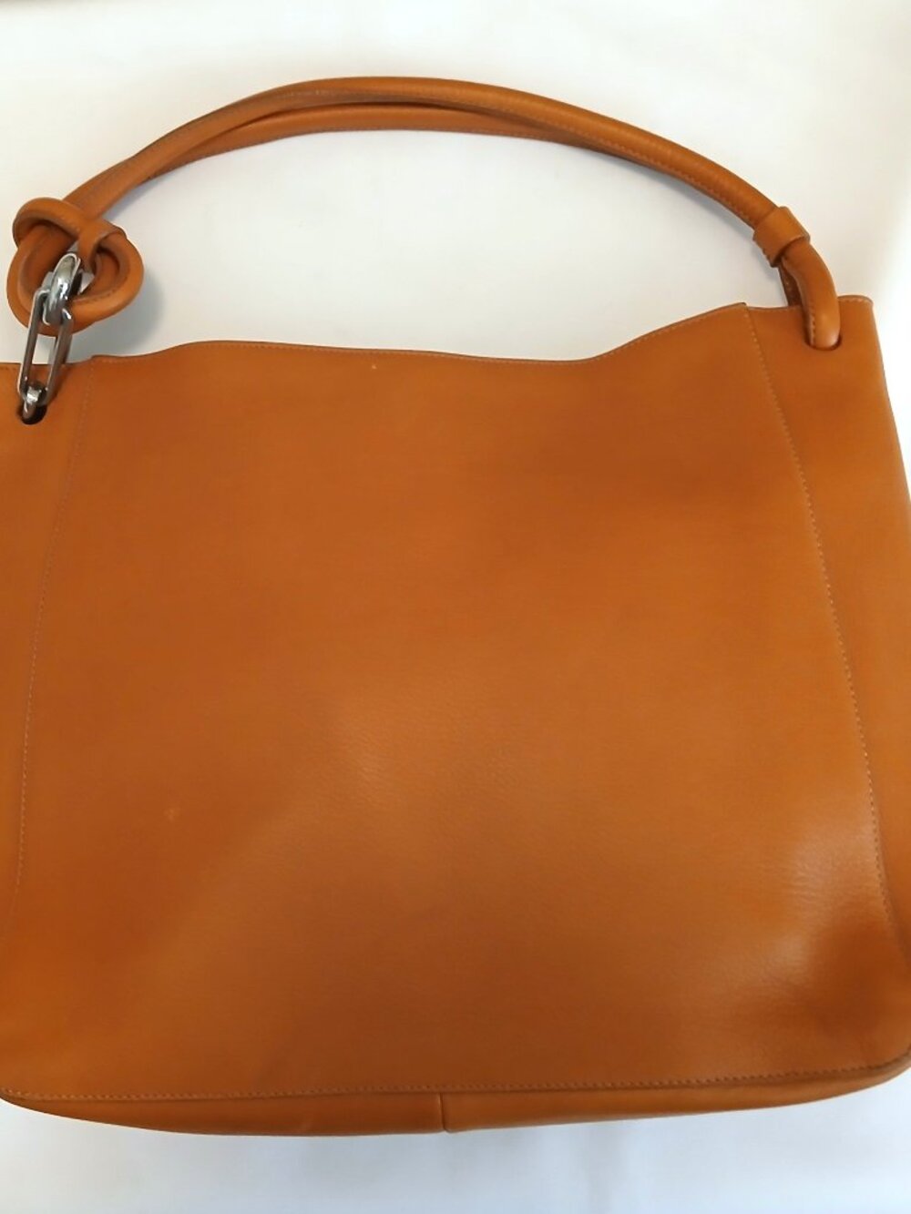 Dooney & Bourke bag designed by Mauro Governa